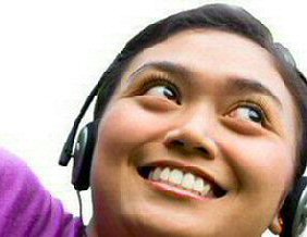 photo of girl wearing headphones, image 3